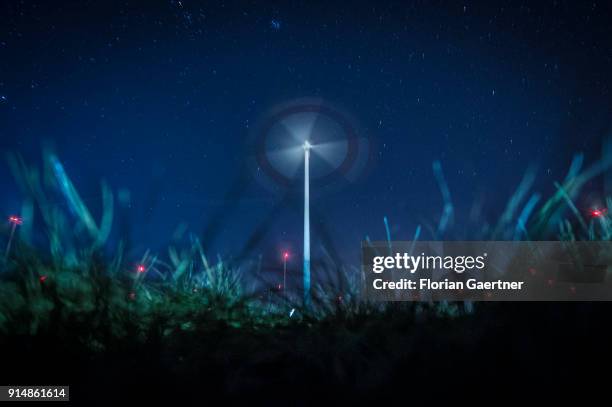 This long exposure shows rotating wind turbines at night on February 05, 2018 in Cottbus, Deutschland.