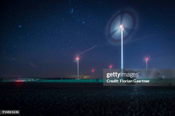 This long exposure shows rotating wind turbines at night on February 05, 2018 in Cottbus, Deutschland.