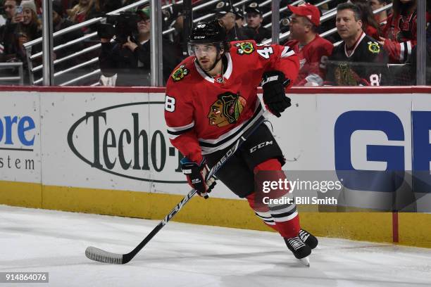 Vinnie Hinostroza of the Chicago Blackhawks skates in the first period against the Detroit Red Wings at the United Center on January 14, 2018 in...