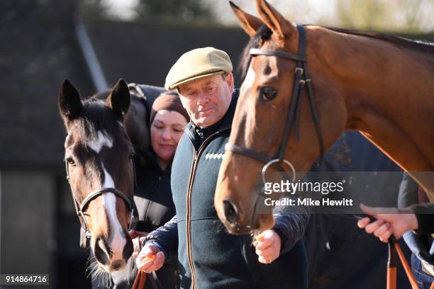 Trainer Nicky Henderson poses for a photo with Jenkins and Verdana Blue at his Lambourne stables ahead of the 2018 Betfair Hurdle at Newbury...