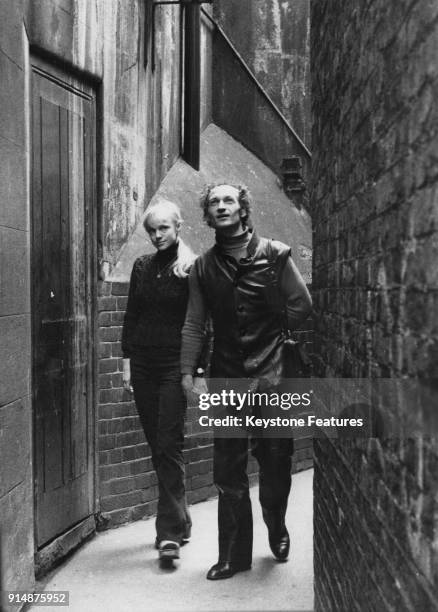 Israeli ballet dancer Valery Panov and his Soviet wife Galina explore the small streets behind the Charing Cross Road in London, between performances...