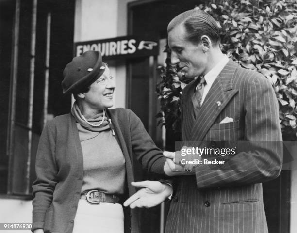 French tennis player Suzanne Lenglen attends the Wimbledon Championships in London as a spectator, 3rd July 1936. She watched the finals of the Men's...