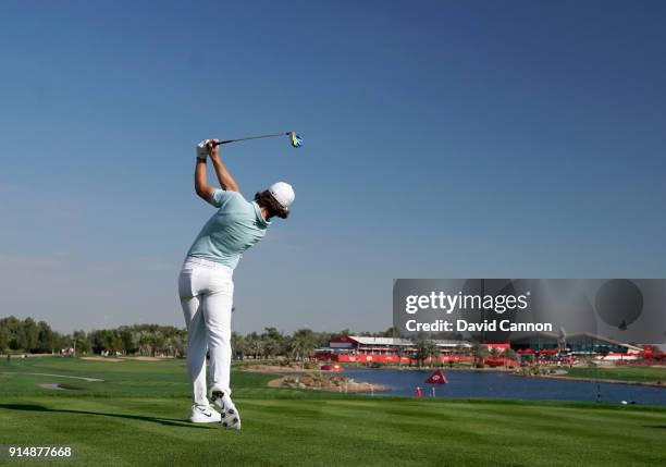 Tommy Fleetwood of England plays a 3 wood tee shot during the first round of the Abu Dhabi HSBC Golf Championship at Abu Dhabi Golf Club on January...