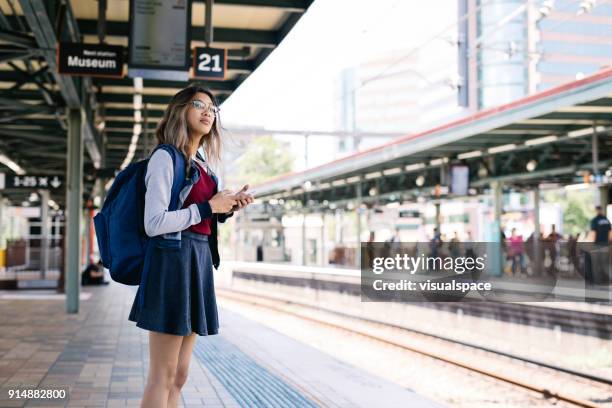 waiting for train in sydney train station - skinny nerd stock pictures, royalty-free photos & images