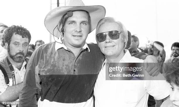 Country Music Singer Garth Brooks and George Jones back stage at Fan fair on June 12,1991 in Nashville,Tennessee .