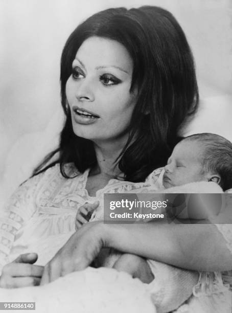 Italian actress Sophia Loren with her baby son Edoardo Ponti in the maternity clinic of the cantonal hospital in Geneva, Switzerland, 1973. Edoardo...