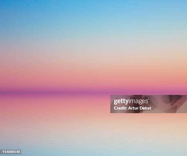 beautiful minimalist art landscape with symmetry. - sunrise beach stock-fotos und bilder