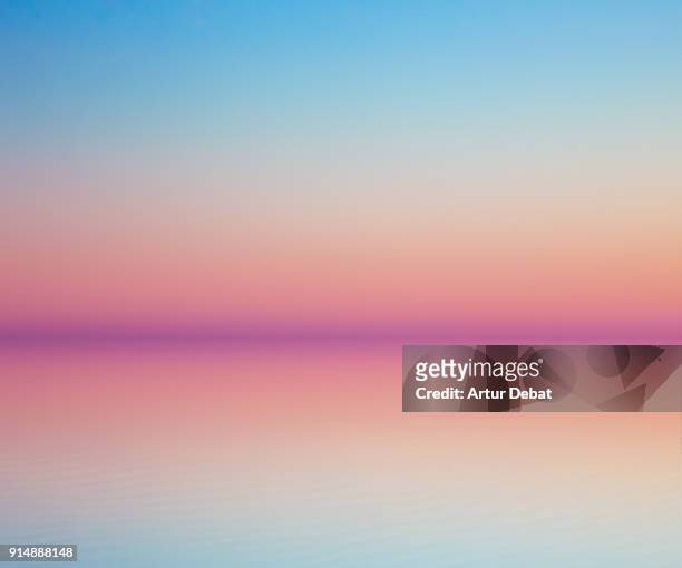 beautiful minimalist art landscape with symmetry. - beach sunrise stockfoto's en -beelden