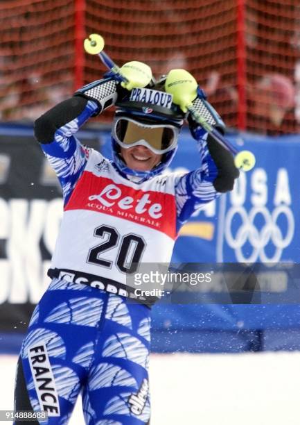 Christel Saioni of France celebrates her win in the women's World Cup slalom 20 November 1999 at Copper Mountain, Colorado. Saioni tied for first...