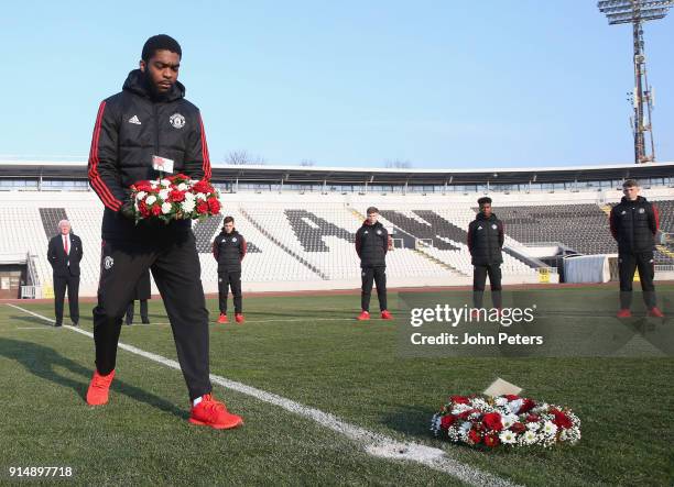 Ro-Shaun Williams of Manchester United U19s lays a wreath in memory of the victims of the Munich Air Disaster on the 60th anniversary at Partizan...