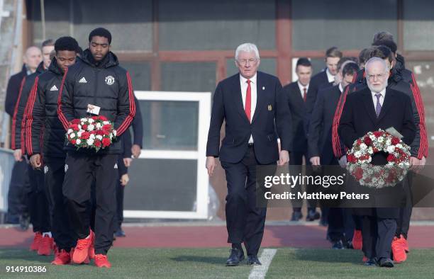 Ro-Shaun Williams of Manchester United U19s and British Ambassador Denis Keefe lay wreaths in memory of the victims of the Munich Air Disaster on the...