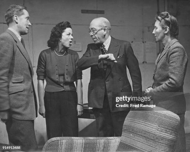 From left to right, actors Ralph Michael as Professor Higgins, Margaret Lockwood as Eliza Doolittle, Gordon Harker as Alfred Doolittle and Beatrice...