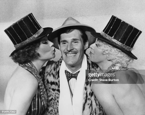 From left to right, actors Antonia Ellis, Ben Cross and Jenny Logan, stars of the hit Broadway musical 'Chicago', pose for a photocall at the...