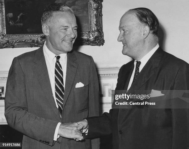 Henry Cabot Lodge Jr. , the United States Ambassador to South Vietnam, meets British Foreign Secretary R. A. Butler or Rab Butler at 1 Carlton...
