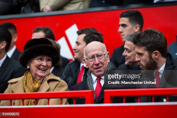 Sir Bobby Charlton and Lady Norma Charlton attend a service to commemorate the 60th anniversary of the Munich Air Disaster at Old Trafford on...