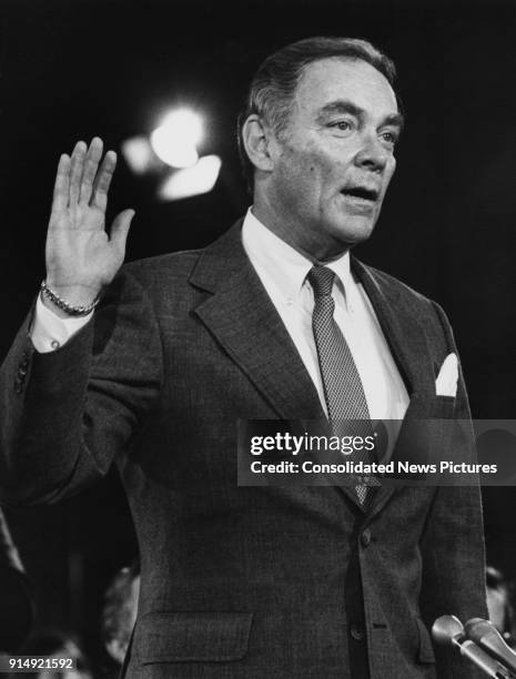 General Alexander Haig is sworn in at his confirmation hearing as the new Secretary of State under US President Ronald Reagan, before the Senate...