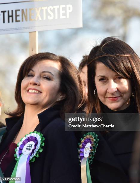 Caroline Flint, Liz Kendall. Female members of the shadow cabinet and Labour politicians wearing suffrage rosettes and banners stand outside the...