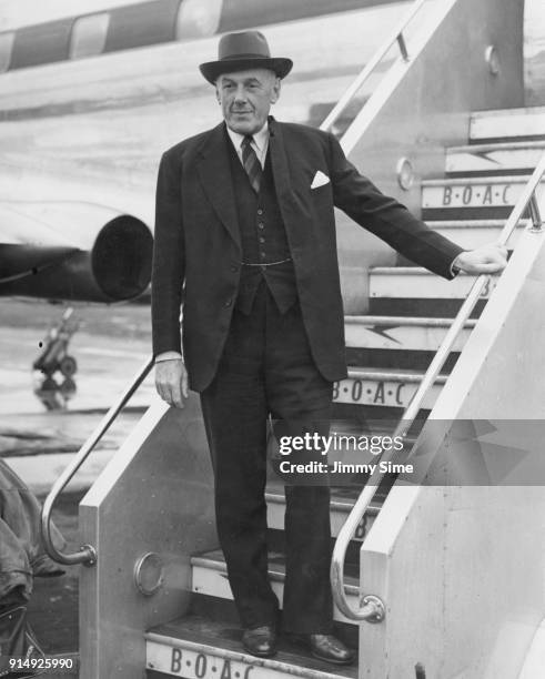 British Colonial Secretary Oliver Lyttelton leaves London Airport for Kenya, for talks with officials on the Mau Mau Uprising, 28th October 1952.