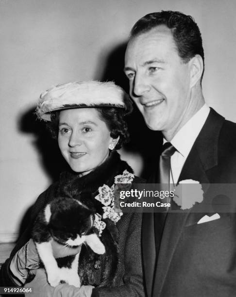 Wartime Allied intelligence officer Odette Churchill leaves Caxton Hall in London with her husband, SOE officer Geoffrey Hallowes after their...