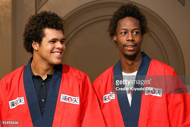 Jo-Wilfried Tsonga of France and Gael Monfils of France attend a welcome reception on day two of the Rakuten Open Tennis tournament at Hotel Grand...