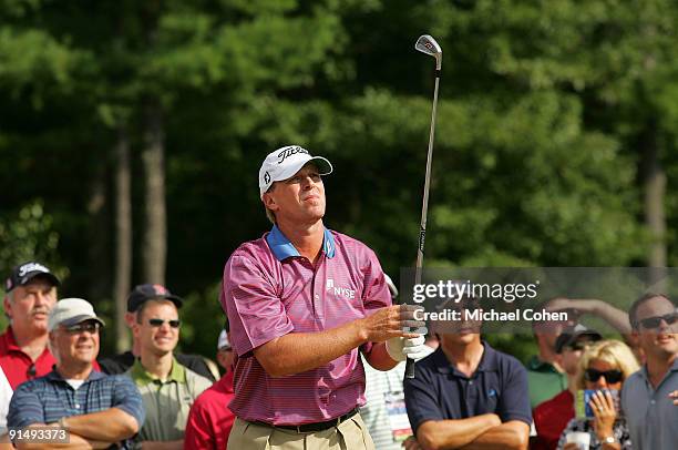 Steve Stricker watches his shot from the rough on the ninth hole during the final round of the Deutsche Bank Championship at TPC Boston held on...