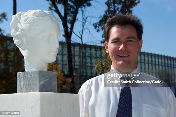 Headshot portrait photograph of John P Anderton, the CDC computer scientist who integrated CDC's presence in the virtual world Second life, posing...