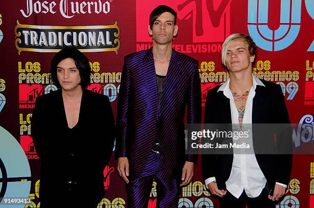 Brian Molko , Stefan Olsdal and Steve Forrest of the music group Placebo arrive at the MTV Latino Awards 2009 at the Racetrack of the Americas on...