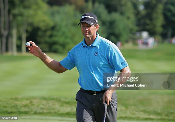 Retief Goosen of South Africa holds up his ball during the final round of the Deutsche Bank Championship at TPC Boston held on September 7, 2009 in...