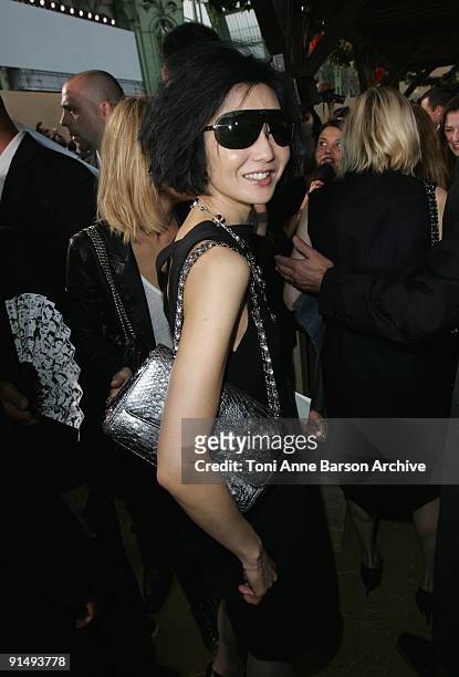 Maggie Cheung attends the Chanel Pret a Porter show as part of the Paris Womenswear Fashion Week Spring/Summer 2010 at the Grand Palais on October 6,...