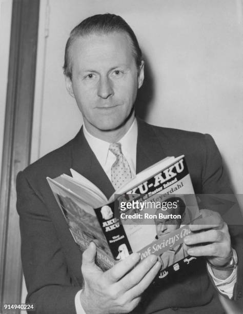Norwegian adventurer Thor Heyerdahl with a copy of his new book 'Aku-Aku: The Secret of Easter Island' after delivering a lecture on Easter Island at...