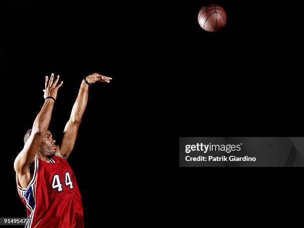 african basketball player shooting basketball - basketball player close up stock pictures, royalty-free photos & images