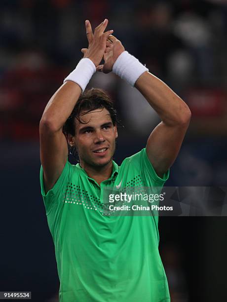 Rafael Nadal of Spain celebrates winning against Marcos Baghdatis of Cyprus in his first round match during day five of the 2009 China Open at the...