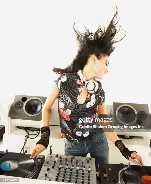 hispanic dj with turntable and sound mixer - dj portrait stock pictures, royalty-free photos & images