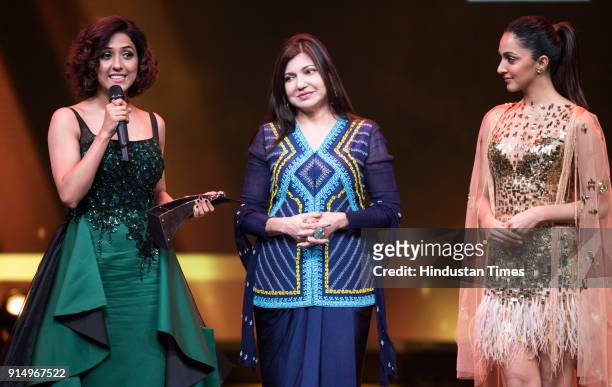 Singer Neeti Mohan recieves Most Stylish Music Star from singer Alka Yagnik and actor Kiara Advani during Hindustan Times India's Most Stylish Awards...