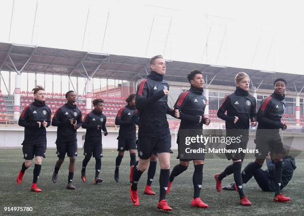 Ethan Hamilton and Nishan Burkart of Manchester United U19s in action during a training session at Vozdovac Stadium on February 6, 2018 in Belgrade,...