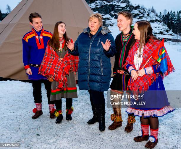 Norwegian Prime Minister Erna Solberg meets with Arctic's indigenous Sami youth as she visits the Sverresborg Folk Museum on February 6, 2018 in...