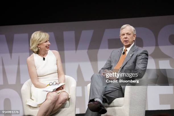 Lowell McAdam, chief executive officer of Verizon Communications Inc., right, speaks as Allie Kline, chief marketing officer of Oath Inc., smiles...