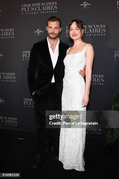 Jamie Dornan and Dakota Johnson attend "Fifty Shades Freed - 50 Nuances Plus Claires" Premiere at Salle Pleyel on February 6, 2018 in Paris, France.