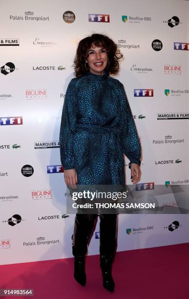 French actress Anne Depetrini poses as she arrives to attend the 25emes Trophees du Film Francais awards ceremony at the Palais Brongniart in Paris...