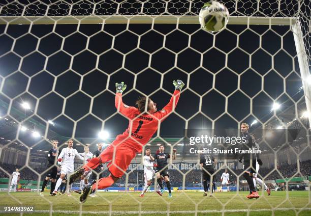 Corentin Tolisso of Muenchen scores the fourth goal during the DFB Pokal quater final match between SC Paderborn and Bayern Muenchen at Benteler...