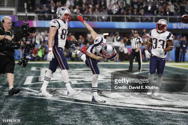 Super Bowl LII: New England Patriots Chris Hogan victorious, spiking ball after scoring touchdown vs Philadelphia Eagles at US Bank Stadium....