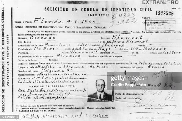 The identification papers of SS officer Adolf Eichmann , which he used to enter Argentina after the war, 1950. He is travelling under the alias...