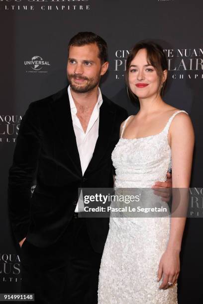 Jamie Dornan and Dakota Johnson attend "Fifty Shades Freed - 50 Nuances Plus Claires" Premiere at Salle Pleyel on February 6, 2018 in Paris, France.
