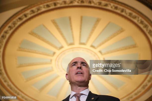 Sen. Robert Casey talks to reporters during a news conference following the weekly policy luncheon at the U.S. Capitol February 6, 2018 in...