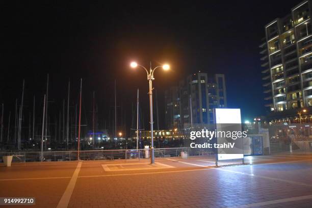 herzliya marina at night, israel. - herzliya marina bildbanksfoton och bilder