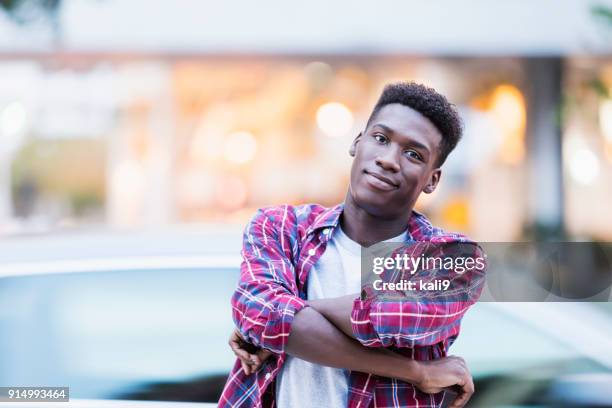 confident young african-american man outdoors - flat top stock pictures, royalty-free photos & images