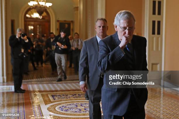 Senate Majority Leader Mitch McConnell heads back to his office following the weekly policy luncheon at the U.S. Capitol February 6, 2018 in...