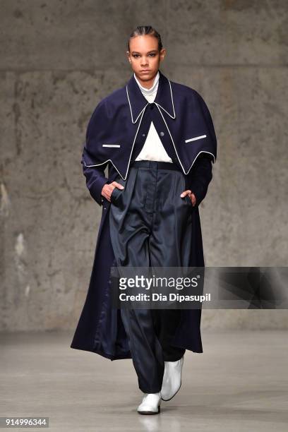 Model walks the runway at the Carlos Campos fashion show during New York Fashion Week Mens' at Skylight Modern on February 6, 2018 in New York City.