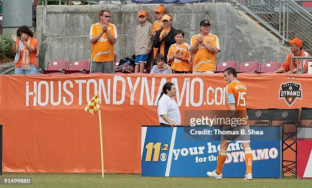 Cam Weaver of the Houston Dynamo leaves the pitch after getting a red card against the Kansas City Wizards on October 4, 2009 at Robertson Stadium in...