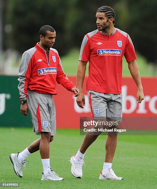 David James and Ashley Cole leave the training session early during the England training session at London Colney on October 6, 2009 in St Albans,...